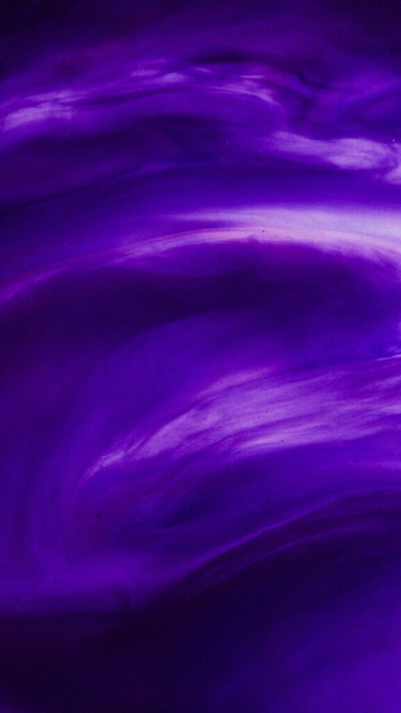 Vibrant purple abstract fluid art with swirling patterns, perfect for modern backdrops and wallpaper.